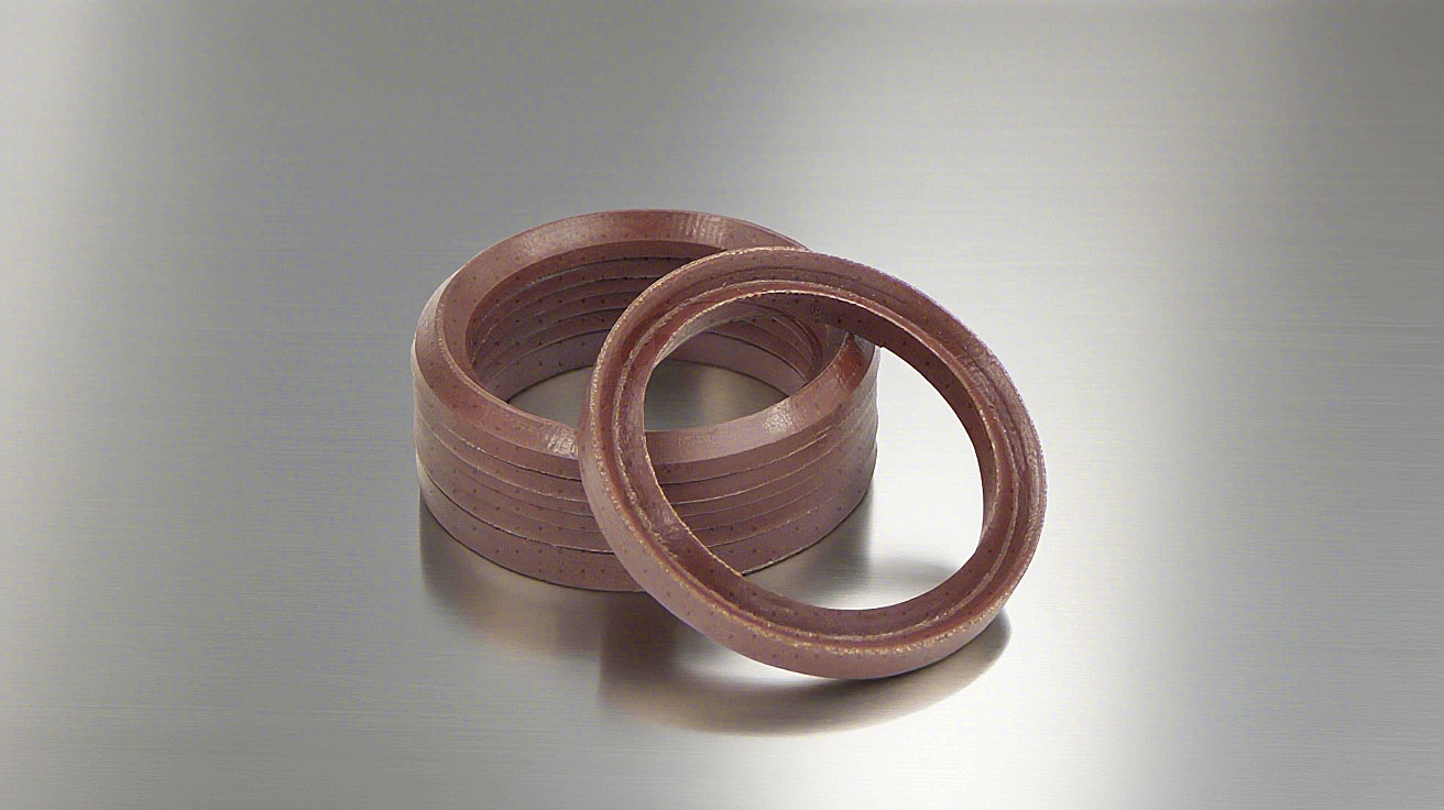 氟橡膠V型夾布油封---是由氟橡膠（FKM）+夾布密封材料制成的油封，主要應(yīng)用于盾構(gòu)機(jī)、冶金設(shè)備、陶瓷設(shè)備、重載油缸、油壓機(jī)等